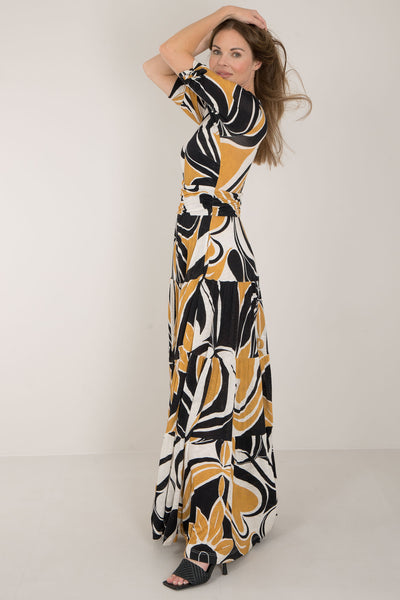 Flowy long jersey dress - Ornamental ochre flower - Mönstrad maxilång trikåklänning